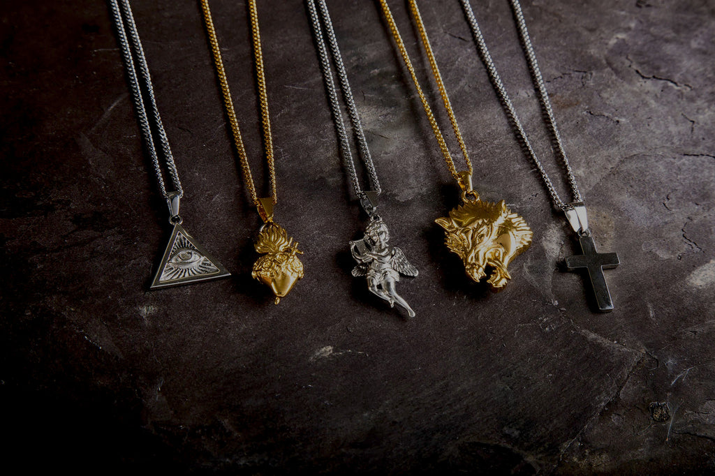 a range of pendant lying on a table.